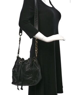 Guaranteed authentic vintage Chanel Lambskin CC Stitched Drawstring Bucket Bag